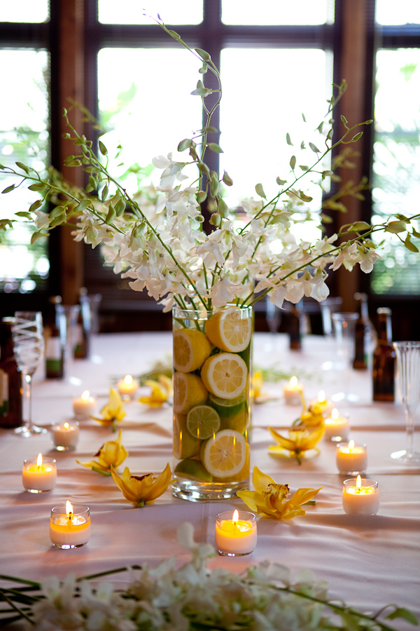 beautiful floral centerpiece with leomns and limes - photo by Seattle based wedding photographers La Vie Photography
